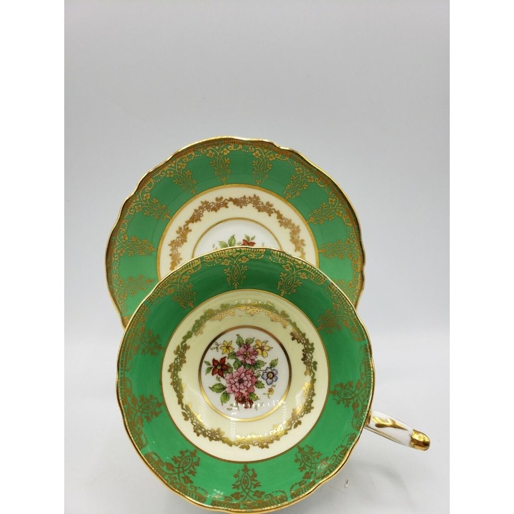Paragon Double Warrant Green Teacup & Saucer Rose Center Gold Painted Center